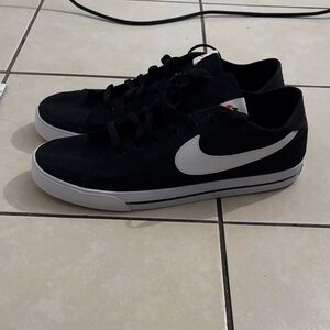 Nike Men’s Black Sneakers with White Swoosh
